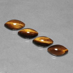 Tiger's Eye طبيعي بلون بني ذهبي، وزن ‎‎ قيراط، شكل ماركيز، مقاس ‎11.8x6.2‎ مم