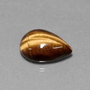 Tiger's Eye طبيعي بلون بني ذهبي، وزن ‎5.33‎ قيراط، شكل شكل الكمثرى، مقاس ‎14.2x10.2‎ مم