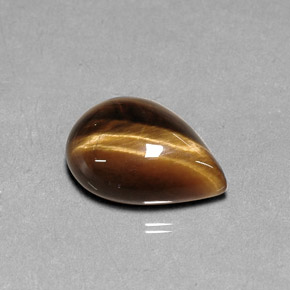 Tiger's Eye طبيعي بلون بني ذهبي، وزن ‎5.17‎ قيراط، شكل شكل الكمثرى، مقاس ‎14.2x10.2‎ مم
