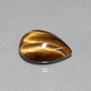 Tiger's Eye طبيعي بلون بني ذهبي، وزن ‎5.36‎ قيراط، شكل شكل الكمثرى، مقاس ‎14.3x10.1‎ مم