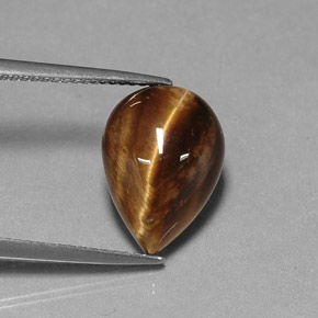 Tiger's Eye طبيعي بلون بني ذهبي، وزن ‎5.18‎ قيراط، شكل شكل الكمثرى، مقاس ‎14.1x10.1‎ مم