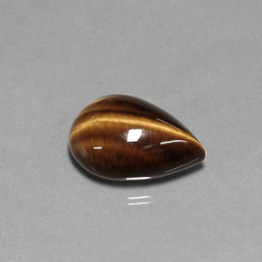 Tiger's Eye طبيعي بلون بني ذهبي، وزن ‎5.27‎ قيراط، شكل شكل الكمثرى، مقاس ‎14.1x10.1‎ مم