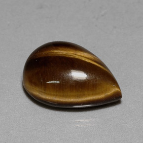 Tiger's Eye طبيعي بلون بني ذهبي، وزن ‎5.23‎ قيراط، شكل شكل الكمثرى، مقاس ‎13.9x10.1‎ مم