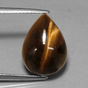 Tiger's Eye طبيعي بلون بني ذهبي، وزن ‎5.23‎ قيراط، شكل شكل الكمثرى، مقاس ‎13.9x10.1‎ مم