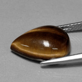 Tiger's Eye طبيعي بلون بني ذهبي، وزن ‎5.23‎ قيراط، شكل شكل الكمثرى، مقاس ‎13.9x10.1‎ مم