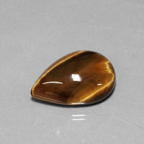 Tiger's Eye طبيعي بلون بني ذهبي، وزن ‎5.18‎ قيراط، شكل شكل الكمثرى، مقاس ‎14.1x10.1‎ مم