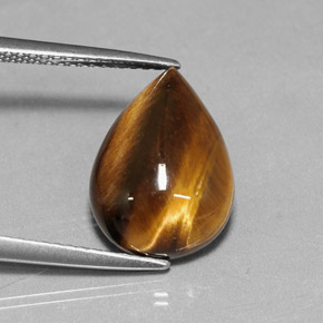 Tiger's Eye طبيعي بلون بني ذهبي، وزن ‎5.18‎ قيراط، شكل شكل الكمثرى، مقاس ‎14.1x10.1‎ مم