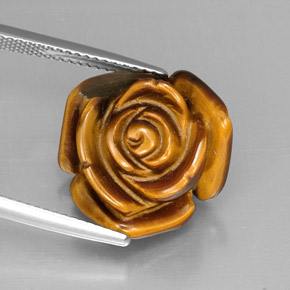 Tiger's Eye طبيعي بلون متعدد الألوان، وزن ‎12.37‎ قيراط، شكل شكل خيالي، مقاس ‎16.5x15.6‎ مم