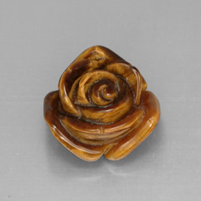 Tiger's Eye طبيعي بلون متعدد الألوان، وزن ‎11.35‎ قيراط، شكل شكل خيالي، مقاس ‎15.7x15.6‎ مم
