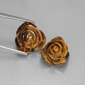 أحجار عين النمر ذهب البنى طبيعية، شكل خيالي، غير شفاف، وزنها  قيراط