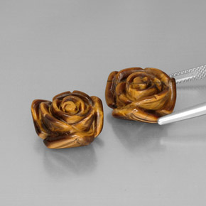 أحجار عين النمر ذهب البنى طبيعية، شكل خيالي، غير شفاف، وزنها  قيراط