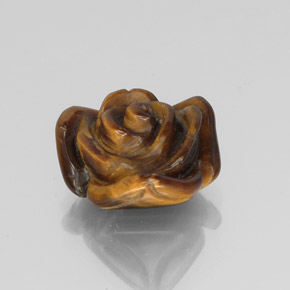 Tiger's Eye طبيعي بلون بني ذهبي، وزن ‎9.71‎ قيراط، شكل شكل خيالي، مقاس ‎15.1x14.9‎ مم