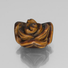 Tiger's Eye طبيعي بلون بني ذهبي، وزن ‎10.61‎ قيراط، شكل شكل خيالي، مقاس ‎15.6x15.2‎ مم