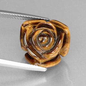 Tiger's Eye طبيعي بلون بني ذهبي، وزن ‎12.81‎ قيراط، شكل شكل خيالي، مقاس ‎16x15.8‎ مم