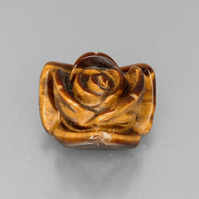 Tiger's Eye طبيعي بلون بني ذهبي، وزن ‎12.81‎ قيراط، شكل شكل خيالي، مقاس ‎16x15.8‎ مم