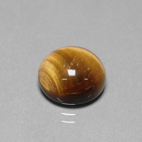 Tiger's Eye طبيعي بلون بني ذهبي، وزن ‎6.68‎ قيراط، شكل دائري، مقاس ‎12.01‎ مم