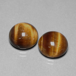 Tiger's Eye طبيعي بلون بني ذهبي، وزن ‎‎ قيراط، شكل دائري، مقاس ‎12.01‎ مم
