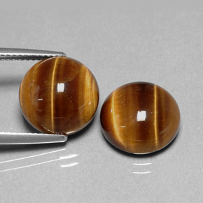 Tiger's Eye طبيعي بلون بني ذهبي، وزن ‎‎ قيراط، شكل دائري، مقاس ‎12.01‎ مم