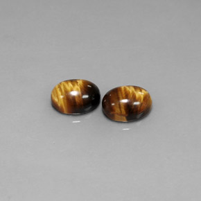 Tiger's Eye طبيعي بلون بني ذهبي، وزن ‎‎ قيراط، شكل بيضاوى، مقاس ‎8.9x6.9‎ مم