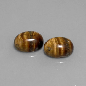 Tiger's Eye طبيعي بلون بني ذهبي، وزن ‎‎ قيراط، شكل بيضاوى، مقاس ‎9x6.9‎ مم