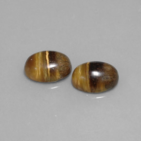 Tiger's Eye طبيعي بلون بني ذهبي، وزن ‎‎ قيراط، شكل بيضاوى، مقاس ‎8.8x6.8‎ مم