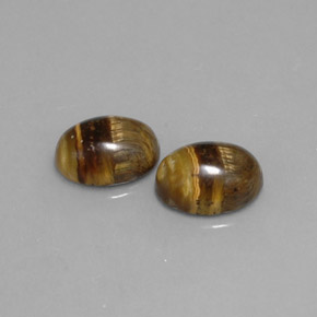 Tiger's Eye طبيعي بلون بني ذهبي، وزن ‎‎ قيراط، شكل بيضاوى، مقاس ‎8.8x6.8‎ مم