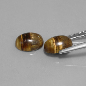 Tiger's Eye طبيعي بلون بني ذهبي، وزن ‎‎ قيراط، شكل بيضاوى، مقاس ‎8.8x6.8‎ مم