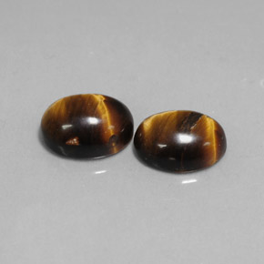Tiger's Eye طبيعي بلون بني ذهبي، وزن ‎‎ قيراط، شكل بيضاوى، مقاس ‎8.8x6.9‎ مم