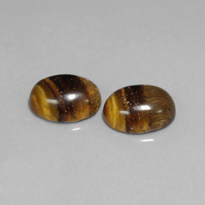Tiger's Eye طبيعي بلون بني ذهبي، وزن ‎‎ قيراط، شكل بيضاوى، مقاس ‎8.9x6.8‎ مم