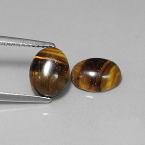 Tiger's Eye طبيعي بلون بني ذهبي، وزن ‎‎ قيراط، شكل بيضاوى، مقاس ‎8.9x6.8‎ مم