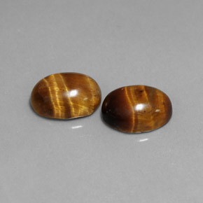 Tiger's Eye طبيعي بلون بني ذهبي، وزن ‎‎ قيراط، شكل بيضاوى، مقاس ‎8.7x6.7‎ مم