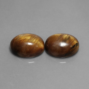 Tiger's Eye طبيعي بلون بني ذهبي، وزن ‎‎ قيراط، شكل بيضاوى، مقاس ‎9x7‎ مم