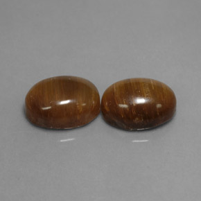 Tiger's Eye طبيعي بلون بني ذهبي، وزن ‎‎ قيراط، شكل بيضاوى، مقاس ‎8.8x6.7‎ مم