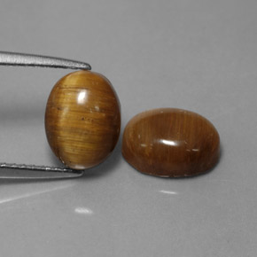 Tiger's Eye طبيعي بلون بني ذهبي، وزن ‎‎ قيراط، شكل بيضاوى، مقاس ‎8.8x6.7‎ مم