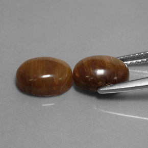 Tiger's Eye طبيعي بلون بني ذهبي، وزن ‎‎ قيراط، شكل بيضاوى، مقاس ‎8.8x6.7‎ مم