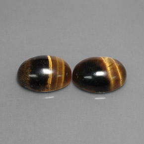 Tiger's Eye طبيعي بلون بني ذهبي، وزن ‎‎ قيراط، شكل بيضاوى، مقاس ‎8.8x6.8‎ مم