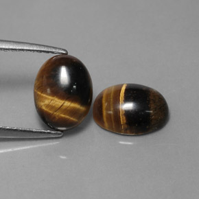 Tiger's Eye طبيعي بلون بني ذهبي، وزن ‎‎ قيراط، شكل بيضاوى، مقاس ‎8.8x6.8‎ مم