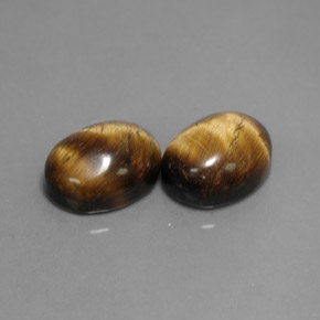 أحجار عين النمر ذهب البنى طبيعية، قصة بيضاوى، غير شفاف، وزنها  قيراط