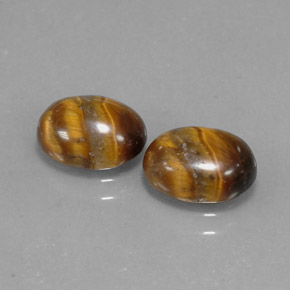 Tiger's Eye طبيعي بلون بني ذهبي، وزن ‎‎ قيراط، شكل بيضاوى، مقاس ‎8.9x6.8‎ مم