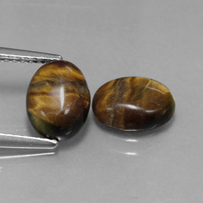 Tiger's Eye طبيعي بلون بني ذهبي، وزن ‎‎ قيراط، شكل بيضاوى، مقاس ‎8.8x6.8‎ مم