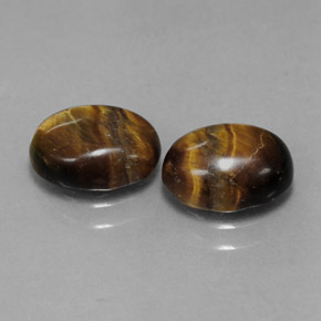 Tiger's Eye طبيعي بلون بني ذهبي، وزن ‎‎ قيراط، شكل بيضاوى، مقاس ‎8.8x6.8‎ مم