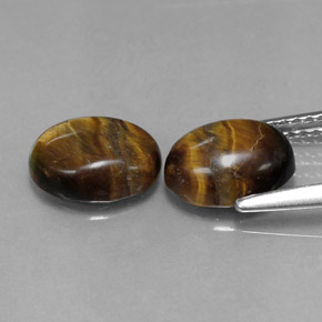 Tiger's Eye طبيعي بلون بني ذهبي، وزن ‎‎ قيراط، شكل بيضاوى، مقاس ‎8.8x6.8‎ مم