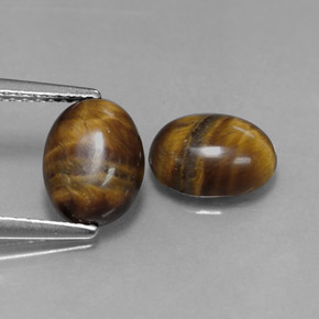 Tiger's Eye طبيعي بلون بني ذهبي، وزن ‎‎ قيراط، شكل بيضاوى، مقاس ‎8.8x6.8‎ مم