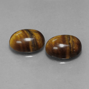 Tiger's Eye طبيعي بلون بني ذهبي، وزن ‎‎ قيراط، شكل بيضاوى، مقاس ‎8.8x6.8‎ مم