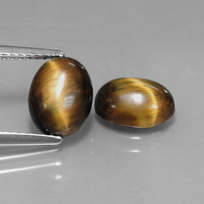 Tiger's Eye طبيعي بلون بني ذهبي، وزن ‎‎ قيراط، شكل بيضاوى، مقاس ‎8.8x6.8‎ مم