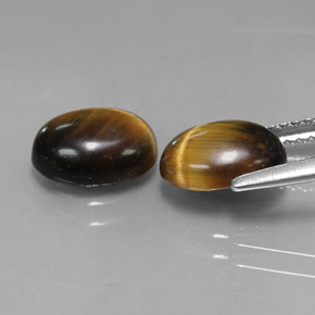 Tiger's Eye طبيعي بلون بني ذهبي، وزن ‎‎ قيراط، شكل بيضاوى، مقاس ‎8.8x6.8‎ مم