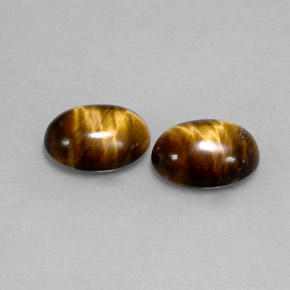 Tiger's Eye طبيعي بلون بني ذهبي، وزن ‎‎ قيراط، شكل بيضاوى، مقاس ‎8.6x6.6‎ مم