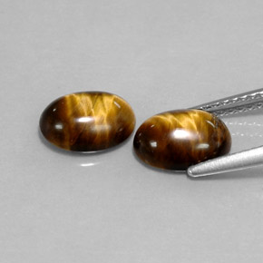 Tiger's Eye طبيعي بلون بني ذهبي، وزن ‎‎ قيراط، شكل بيضاوى، مقاس ‎8.6x6.6‎ مم