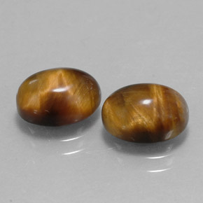 Tiger's Eye طبيعي بلون بني ذهبي، وزن ‎‎ قيراط، شكل بيضاوى، مقاس ‎9.1x7‎ مم