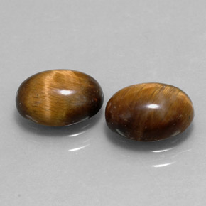Tiger's Eye طبيعي بلون بني ذهبي، وزن ‎‎ قيراط، شكل بيضاوى، مقاس ‎8.7x6.7‎ مم